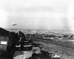 American men and equipment being landed near Colleville-sur-Mer, France, 9 Jun 1944