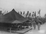 Oliver P. Smith walking through his Assistant Division Commander quarters on Peleliu, Palau Islands, 1944