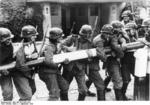 German troops removing a gate at a border checkpoint, Zoppot-Gdingen (Sopot-Gdynia) Street in Danzig (Gdańsk), 1 Sep 1939, photo 2 of 2