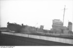 HMS Cambeltown wedged in the dock gates of Saint-Nazaire, France, 28 Mar 1942, photo 02 of 10