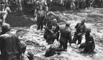 US Marines building a sandbag ramp for an incoming LST ship, Cape Gloucester, New Britain, Bismarck Archipelago, Dec 1943