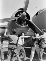 Workers checking a newly completed PV-1 aircraft, Lockheed factory, Burbank, California, United States, Aug 1943