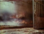 Burning seaplane hangar, Sand Island, Midway Atoll, 4 Jun 1942