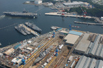 USS Kitty Hawk and other American warships at United States Fleet Activities Yokosuka naval base, Japan, 25 May 2006