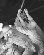 Sculptor Felix de Weldon working on the plaster model of the US Marine Corps War Memorial, circa 1954, photo 6 of 7