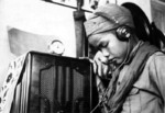 Chinese girl scout monitoring wireless traffic, Yunfu, Guangdong Province, China, 1936