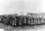 Japanese-American troops of US 442nd Regimental Combat Team at Armistice Day service, Fays, France, 11 Nov 1944