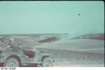 German troops in a vehicle observing a prairie fire near Stalingrad, Russia, 23 Sep 1942