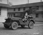 US Army soldier dressed as Santa Claus during the Christmas holiday season at Camp Lee, Virginia, United States, Dec 1941, photo 1 of 2