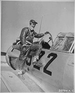 US Army Air Force pilot Captain Benjamin Oliver Davis, Jr. climbing into a Vultee AT-6 Texan aircraft, Tuskegee, Alabama, United States, Jan 1942