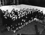 WAVES personnel examining aircraft propellers aboard escort carrier Mission Bay, 20 Aug 1944