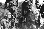 Rear Admiral Burke participating in military field exercises with US Army and US Marine Corps personnel, Korea, 1951