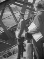 Ferdinand Catlos observing a destroyed rail bridge, Komancza, southern Poland, circa late Sep 1939