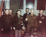 Ivan Susloparov, Frederick Morgan, Walter Smith, Dwight Eisenhower, Arthur Tedder, and Harold Burrough after signing of German surrender documents, Rheims, France, 7 May 1945; note Eisenhower holding pens used, and Eisenhower