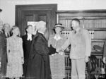 Chief Justice of Victoria, Australia Edmund Herring shaking hands with Major General C. E. M. Lloyd, Melbourne, Australia, 2 Feb 1944