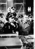 SS-Reichsführer Heinrich Himmler and Rudolf Heß viewing a model of the Dachau Concentration Camp, Dachau, Germany, 8 May 1936