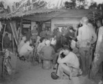 Lieutenant General Holland Smith, Brigadier General Graves Erskine, and other US Marine officers, Saipan, Mariana Islands, Jun 1944