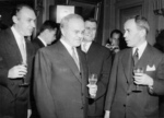 Soviet Foreign Minister Vyacheslav Molotov speaking with French Foreign Minister Antoine Pinay, Geneva, Switzerland, 12 Nov 1955