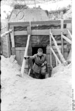 Benito Mussolini inspecting a defensive fortification, Italy, 1944; note the Panzer V turret