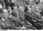 Otto Skorzeny, Helmut Körner, Fritz Reinhardt, and Kurt Zschirnt at a rally at the Sportpalast in Berlin, Germany, 3 Oct 1943, photo 1 of 2