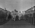 Captain George C. Montgomery inspecting USS Anzio, 16 Dec 1944, photo 2 of 2