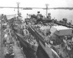 Destroyer Killen, heavy cruiser Canberra, and destroyer Claxton being repaired in floating drydock USS ABSD-2, Manus, Admiralty Islands, 2 Dec 1944