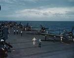 F6F Hellcat fighters warming up aboard USS Cowpens during Marshall Islands Campaign, Pacific Ocean, Jan 1944, photo 1 of 2