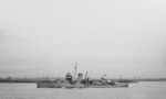 USS Ellet underway during the Presidential Naval Review, Hudson River, United States, 27 Apr 1939; note the city of New York in background