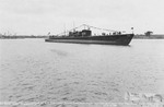 Submarine Flying Fish shortly after launching, with tugs Yaqui and Pennacook, Portsmouth Naval Shipyard, Kittery, Maine, United States, 9 Jul 1941