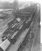 German carrier hull Flugzeugträger A (future Graf Zeppelin) under construction, Kiel, Germany, 22 Mar 1937, photo 1 of 9