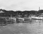 Ha-102, Ha-104, and Ha-101 (listed left to right) at Yokosuka Naval Base, Japan, 7 Sep 1945; note five Kairyu submarines on left side of photograph