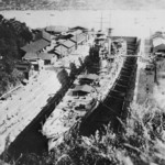 Haguro under construction in Drydock No. 3 of the Mitsubishi shipyard in Nagasaki, Japan, 20 Oct 1928