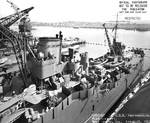 Indianapolis at Mare Island Navy Yard, California, view of her after half from port side, with light cruiser Raleigh in background, 19 Apr 1942