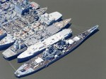 Aerial view of battleship USS Iowa moored outboard of the USS Proteus as part of the reserve fleet in Suisun Bay, California, United States, 2006