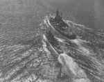 USS North Carolina and destroyer-minelayer USS Lindsey conducting high-speed fueling position-keeping exercises off the California coast, 8 Oct 1944.