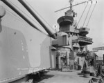 View of aboard USS Quincy from the port side of gun turret No. 1, looking aft, New York Navy Yard, Brooklyn, New York, United States, 29 May 1942; 1 on the photograph marked the splinter protection on the pilothouse, 2 the 20-millimeter guns, and 3 the 1.1-inch guns