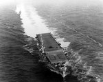 San Jacinto underway off the US east coast, 23 Jan 1944, photo 2 of 2; note SNJ training plane on flight deck