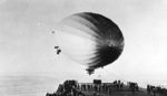 Airship USS Los Angeles landing on carrier USS Saratoga, 27 Jan 1928