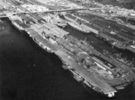 USS Bunker Hill, USS Bon Homme Richard, USS Essex, USS Ticonderoga, USS Indiana, and USS Alabama at Pier 92, Seattle, Washington, United States, 9 Jan 1947