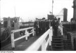 German Navy Lieutenant Captain Klaus Ewerth and his sailors boarding U-36, Kiel, Germany, 14 Dec 1936