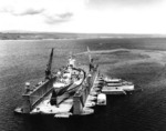 USS West Virginia in floating drydock USS ABSD-1 off Aessi Island, Espiritu Santo, New Hebrides, 13 Nov 1944