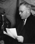 Attorney General of California Earl Warren speaking at the launching ceremony of submarine Whale, Mare Island Navy Yard, Vallejo, California, United States 14 Mar 1942