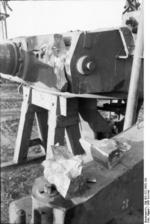 Damaged turret of a Panzer VI Tiger I heavy tank under repair, Russia, 21 Jun 1943