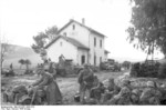 German troops at Sidi Nsia, Tunisia, early 1943; note R75 motorcycle and US-built M3 halftrack vehicle with German markings