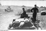 Panzer III tanks and SdKfz. 251 halftrack vehicles in Poland, Jun 1941