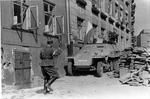 Polish resistance fighters with captured German SdKfz. 251 halftrack vehicle, named 