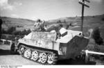 German troops aboard a SdKfz. 251 halftrack vehicle, Hungary, 1944