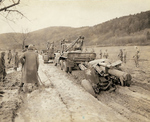 155mm howitzer stuck in mud, Europe, 1945