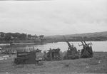 Abandoned Japanese Type 96 25mm anti-aircraft mounts at Waingapu, Dutch East Indies, 25 Feb 1949