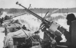 DShK machine gun and other weapons atop a Soviet armored train, 1941